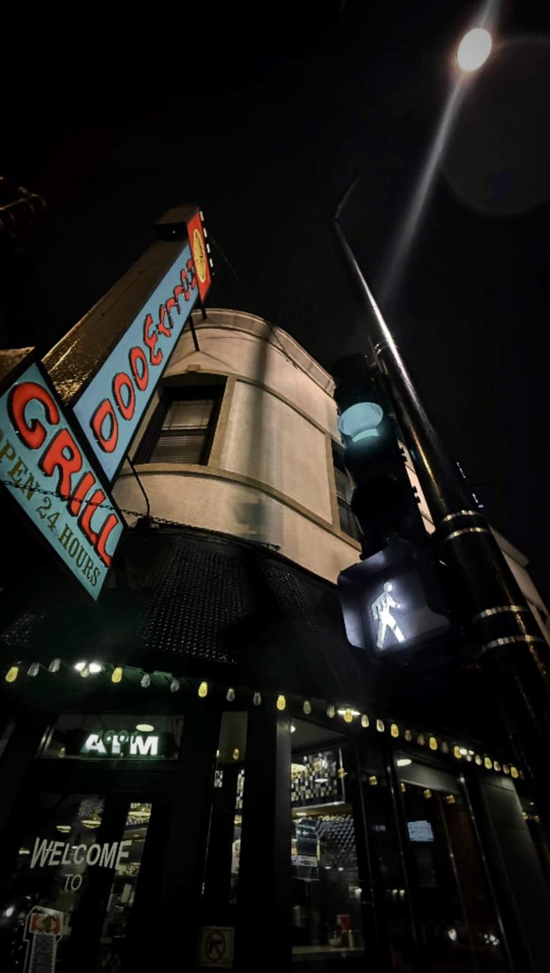 Neon diner sign at night